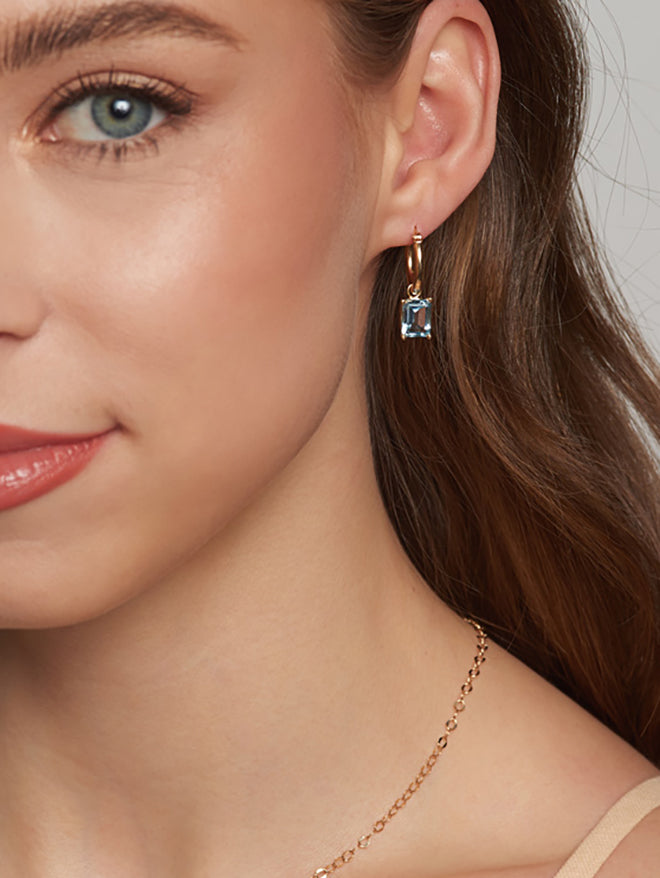 Gold Hoop With Emerald Cut Gem Dangle